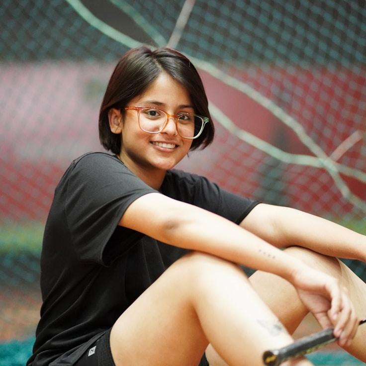 Alex Rivera, Lead Design Curator at AtlasScrollFolio, reviewing corporate floral arrangements